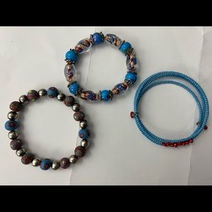3 blue and burnt orange beaded bracelets